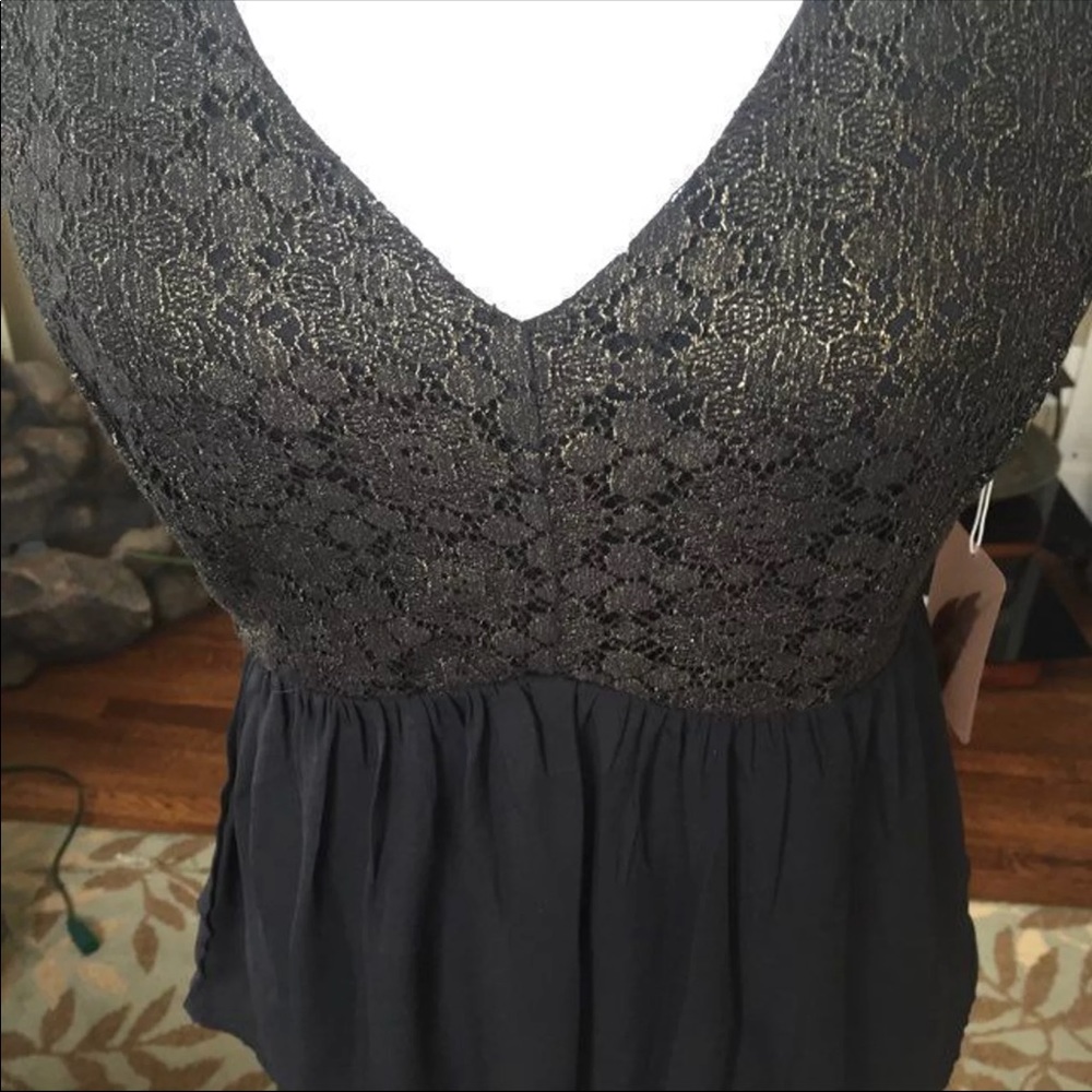 Metallic olive peplum blouse